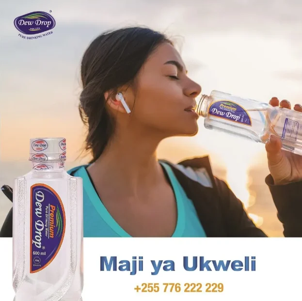 Woman drinking Dew Drop Premium water